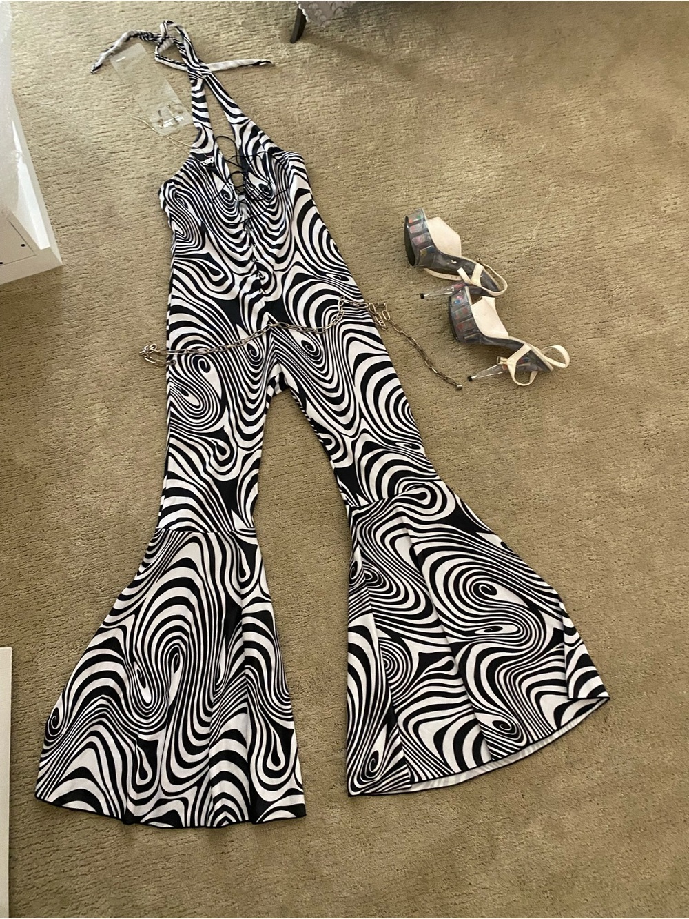 California Costumes Black & White Swirl Halter Flared Jumpsuit. Disco party cost
